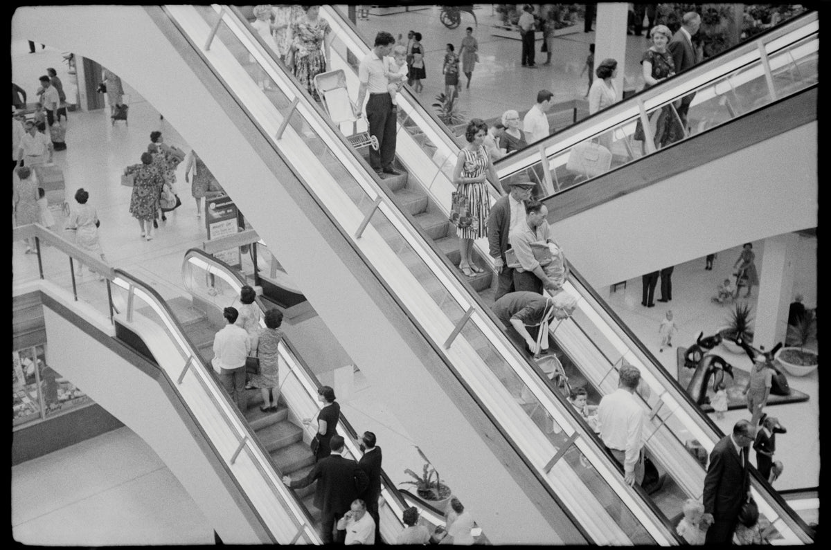Shoppers on escalators at Roselands Shopping Centre, Roselands, Sydney, 1965. Image courtesy of Mitchell Library, State Library of NSW and SEARCH Foundation.